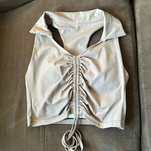 Light brown V neck shirt